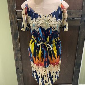 Off the shoulder Retro Dress with tie waist, pockets, & back cut out accent.